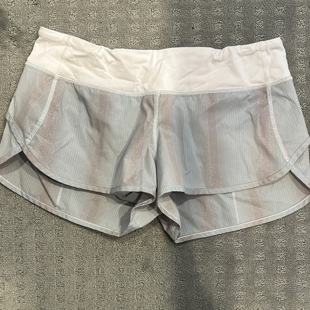 Lululemon Speed Up Low Rise 2.5” lined Shorts Gray, light pink and has a shimmer